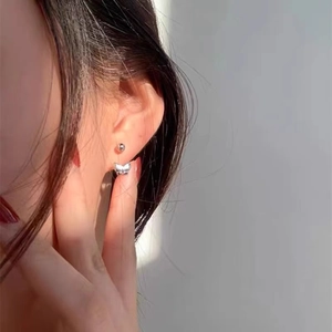 Elegant butterfly drop earring set with silver ball stud shown on model in natural light