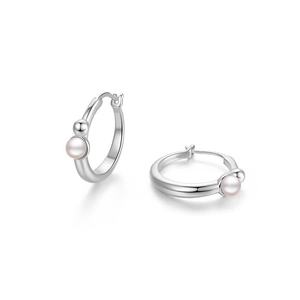 Minimalist silver hoop earrings featuring small pink pearls and metal beads on white background
