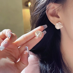 French vintage camellia stud earrings with gold frame and pearlescent petals