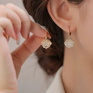 Elegant gold-plated cloud lock earrings with white opal gemstone and cubic zirconia
