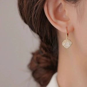 Elegant gold heart earrings with auspicious cloud motifs and white inlay for women