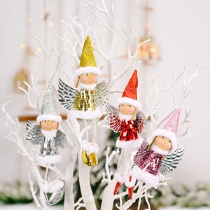 Detail of four colorful sequined Christmas angel ornaments with wings on a white tree