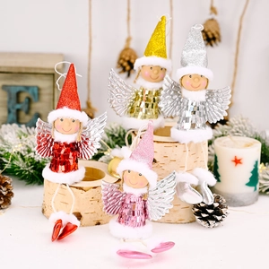 Set of four Christmas angel pendants with sequins and glitter wings on wooden display