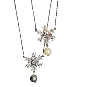 Elegant snowflake zircon pendant necklace with hanging pearl detail for women