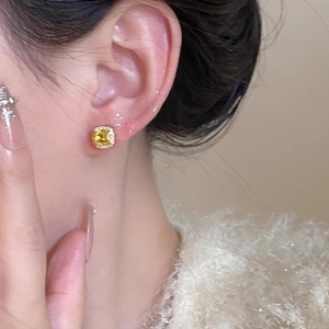 Elegant gold-tone square yellow crystal stud earrings with halo cubic zirconia accents