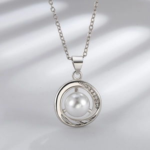Elegant silver necklace with a large round pearl and sparkling zircon spiral pendant
