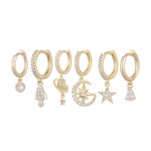 Detailed set of six gold-plated earrings with celestial charms and zircon inlays