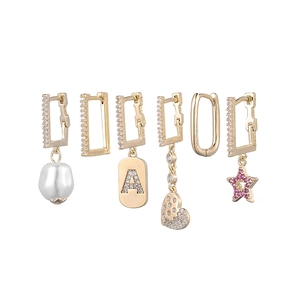 Detailed set of six gold-plated huggie earrings with pearls, heart, and star pendants
