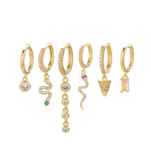 Detailed set of six gold earrings featuring snake designs and colorful zircon accents