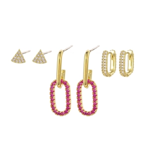 Detailed set of three gold earrings with white zircon triangles and pink gemstone drops