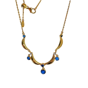 Vintage gold teardrop necklace with five deep blue gemstones and crescent moon charms