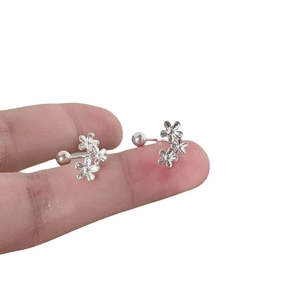 Silver triple floral screw back studs with three detailed five-petal flowers