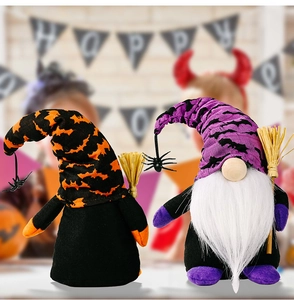 Detail of Halloween gnome plush dolls with bat patterns and mini broom accessories