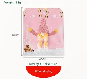 Detail of pink Christmas gnome chair cover with 3D sequin hat and golden bell motifs