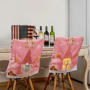 Pink Christmas chair covers with illuminated gnome design and sparkling sequins for decor