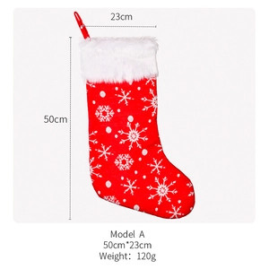 Detail showing red Christmas stocking dimensions 50x23cm with white snowflake pattern