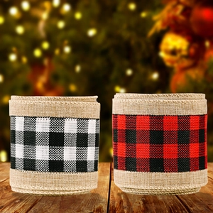 Rustic burlap Christmas ribbons with buffalo plaid patterns on a festive wooden surface