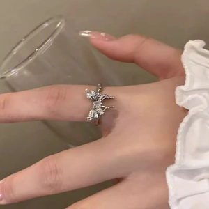 Adjustable silver butterfly ring with cubic zirconia crystals in minimalist style