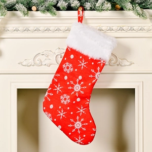 Classic red Christmas stocking with white snowflake embroidery and fluffy faux fur trim