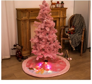 Detailed view of pink Christmas tree skirt with plush edges, LED lights, and gnome patterns