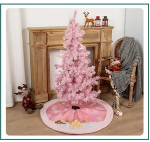 Detail of pink Christmas tree skirt with plush fur trim and cute gnome snowflake design