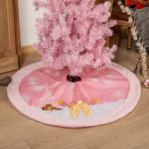 Pink Christmas tree skirt with festive gnome decoration and plush white faux fur trim