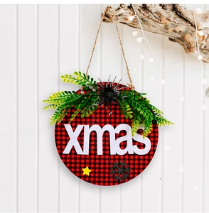 Detail of red buffalo plaid Christmas hanging sign with xmas felt lettering and star