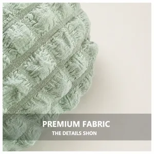 Detail of light green bubble textured fabric showing unique pleated patterns