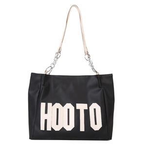Large black HOOTO tote bag with white lettering and silver chain strap for commuting