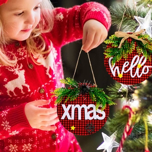 Christmas round wooden door signs with red plaid and greenery in a festive home setting