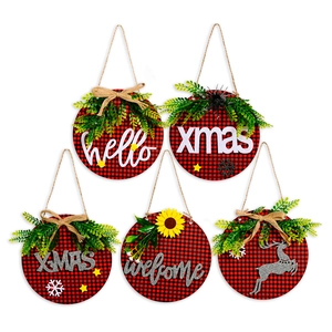 Five-piece buffalo plaid Christmas wooden door hangers with evergreen and bow details