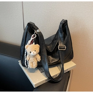 Black PU shoulder bag with vintage pleated texture and cute brown teddy bear pendant