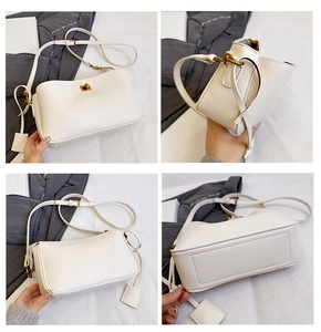 Detailed views of a beige crossbody bag with gold hardware and accordion side panels