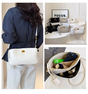 Detailed views of leather crossbody bags in white, black and gray with gold twist locks