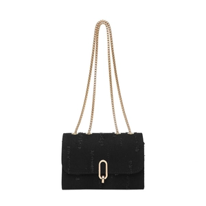 Minimalist black textured chain shoulder bag with a vintage design and gold oval lock