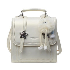 Cream-white versatile leather backpack and handbag with cute plush monster charm and star rivets