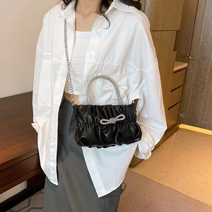 Chic black pleated bucket bag with rhinestone bow and chain strap for women