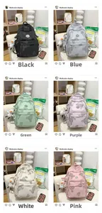 Detailed grid view of printed backpacks in six colors with a small duck pendant