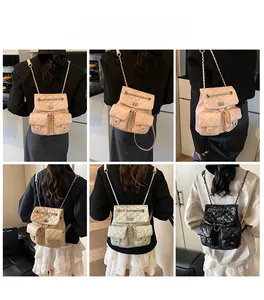 Quilted backpack featuring metal chain straps and multiple pockets in modern lifestyle view