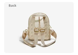 Rear view of bear print backpack showing adjustable nylon straps and metal buckles