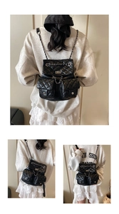 Detailed views of black quilted leather backpack with silver chain straps and turn-lock