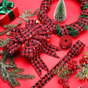 Christmas red and black buffalo plaid ribbon with white snowflake patterns and bows
