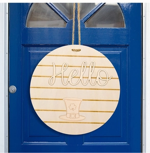 Close-up of wooden St. Patrick's Day door sign with 3D Hello text on a blue door