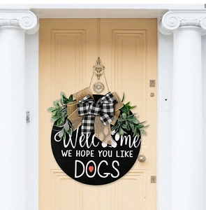 Close-up of rustic wooden dog-themed welcome sign with checkered bow and greenery