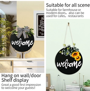 Detail view of wooden welcome door signs with sunflowers, bows and rustic greenery