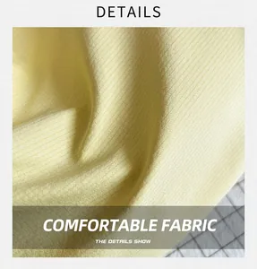 Close-up of pale yellow ribbed knit fabric texture with soft vertical striped patterns