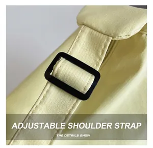 Detail of adjustable shoulder strap on minimalist pale yellow canvas tote bag