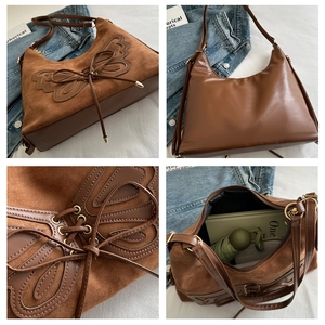 Détails du sac hobo marron avec empiècements en daim et décor de nœud chic