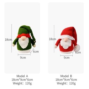 Detail view of knitted Christmas gnomes showing dimensions 18x9x6cm and soft texture