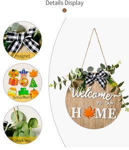 Detail of wooden home sign with magnetic holiday ornaments and hanging bow decor